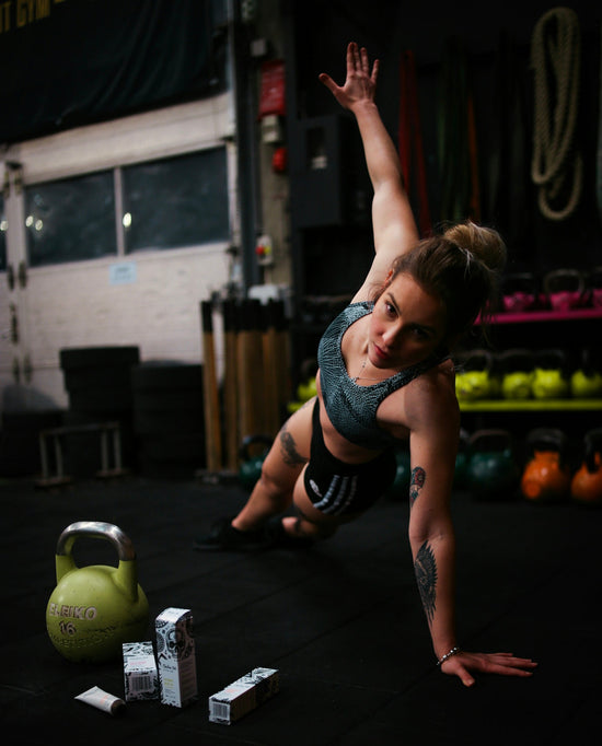 woman exercising in gym creatine monohydrate for workout performance