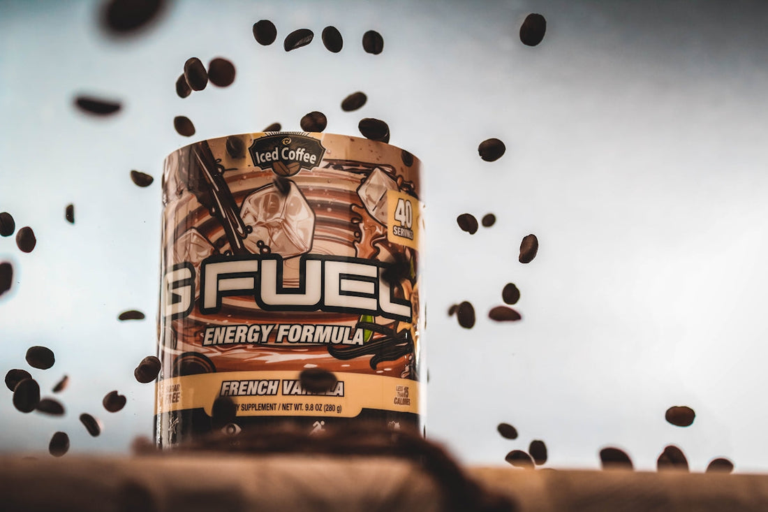 a can of fuel energy formula surrounded by coffee beans. creatine and greens superfood powder