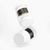 BigSouthStrength vegan protein powder in a white container with vanilla flavor alongside ingredients and supplements.