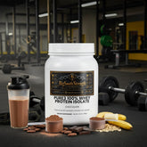 Chocolate whey protein isolate tub with shaker, bananas, oats, and chocolate in gym setting