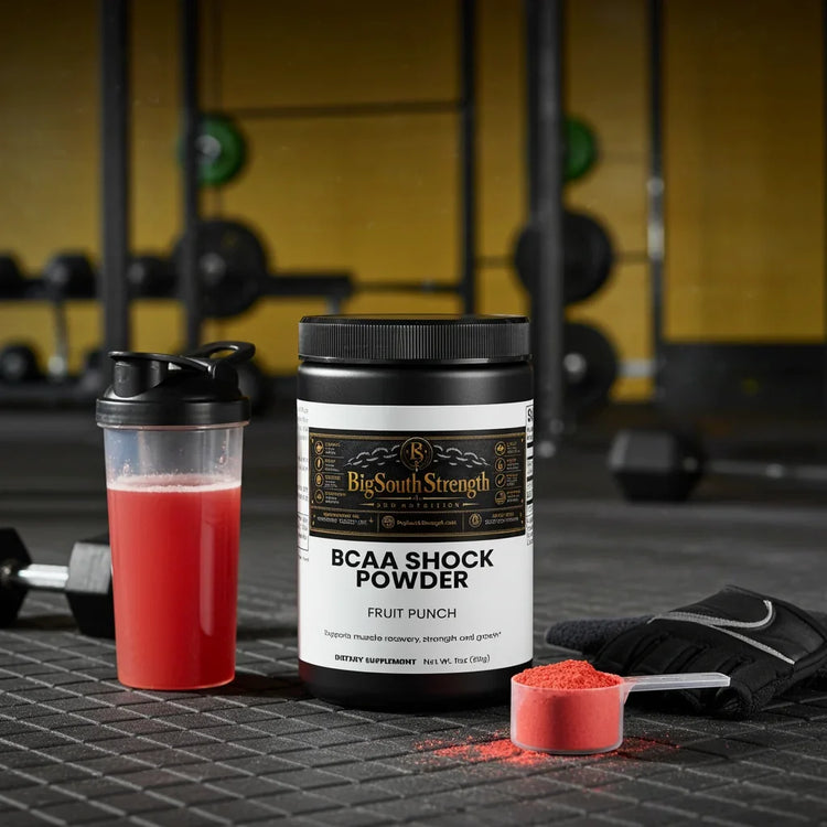 BCAA Shock Powder in Fruit Punch flavor with shaker and scoop, ideal for muscle recovery and strength training