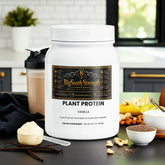 BigSouthStrength vegan protein powder in a white container with vanilla flavor alongside ingredients and supplements.