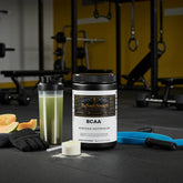 BCAA Honeydew Watermelon supplement with gym gear and green shake for muscle recovery