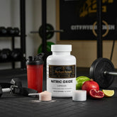Nitric Oxide capsules with gym gear, shaker bottle, and fruits for muscle recovery and performance