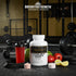 L-Citrulline & L-Arginine Stack capsules with shaker, fruit, and gym gear for muscle recovery and performance