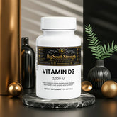 Vitamin D3 2,000 IU supplement bottle for bone density and cell health, displayed on marble with decor