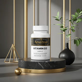 Vitamin D3 2,000 IU supplement bottle for muscle growth and wellness on marble stand