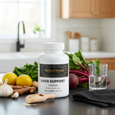 BigSouthStrength Liver Support Capsules with natural ingredients like lemon, garlic, and beets in a kitchen setting