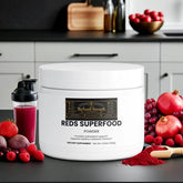 Reds Superfood Powder with antioxidant support, surrounded by fresh berries and pomegranates for wellness.