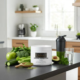 Greens Superfood Powder with fresh veggies, avocado, and shaker for daily wellness and recovery